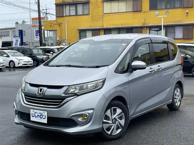 ホンダ フリード ハイブリット G ホンダセンシング 佐賀県 2017(平29)年 10.9万km ルナシルバーM こちらは現金またはオートローンご利用時の価格です。/自社ローンご希望の方は別途その旨お申付け下さい/禁煙車/純正ナビVXM-174VFi（ＣＤ・ＤＶＤ・フルセグ・ＢＴ・ＳＤ）/バックカメラ　/社外前後ドライブレコーダー　/ビルトインＥＴＣ　/両側パワースライドドア　/レーダークルーズコントロール　/衝突軽減ブレーキ　/レーンキープアシスト/横滑り防止/先行車発進お知らせ/車線逸脱警報/アイドリングストップ/純正フロアマット/オートライト/HIDライト/フォグライト/スマートキー/プッシュスタート/スペアキー1本/保証書