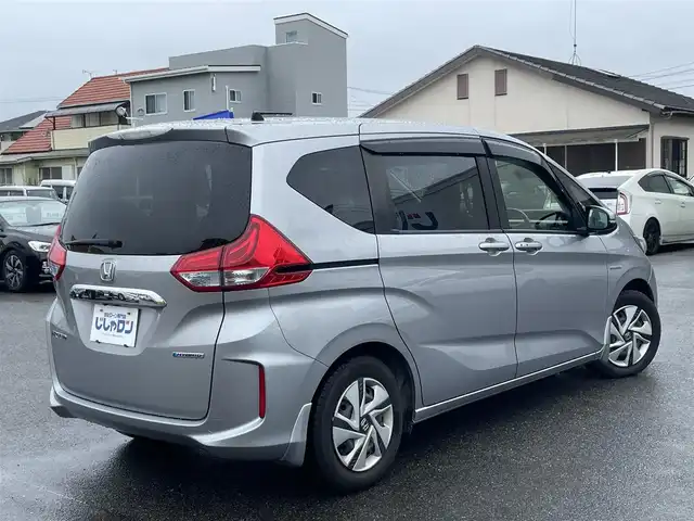 ホンダ フリード ハイブリット G ホンダセンシング 佐賀県 2017(平29)年 10.9万km ルナシルバーM こちらは現金またはオートローンご利用時の価格です。/自社ローンご希望の方は別途その旨お申付け下さい/禁煙車/純正ナビVXM-174VFi（ＣＤ・ＤＶＤ・フルセグ・ＢＴ・ＳＤ）/バックカメラ　/社外前後ドライブレコーダー　/ビルトインＥＴＣ　/両側パワースライドドア　/レーダークルーズコントロール　/衝突軽減ブレーキ　/レーンキープアシスト/横滑り防止/先行車発進お知らせ/車線逸脱警報/アイドリングストップ/純正フロアマット/オートライト/HIDライト/フォグライト/スマートキー/プッシュスタート/スペアキー1本/保証書