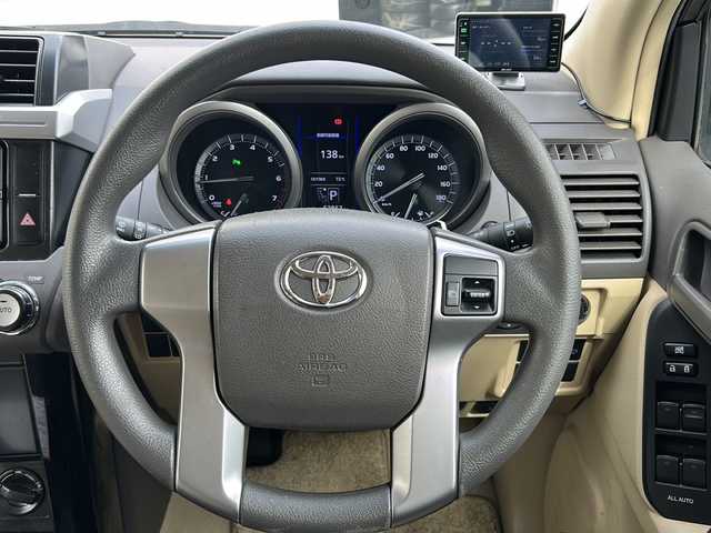 トヨタ ランドクルーザー プラド TX 富山県 2016(平28)年 6.3万km ホワイトパールクリスタルシャイン 〇4WD/〇ムーンルーフ/〇純正ナビ/〇フルセグTV/〇バックモニター/〇ビルトインETC/〇ドライブレコーダー/〇クリアランスソナー/〇横滑り防止装置/〇純正LEDヘッドランプ/〇オートライト/〇オートエアコン/〇ベージュファブリックシート/〇レーザーレーダー探知機/〇社外17インチアルミホイール/〇スマートキー/〇プッシュエンジンスタート/〇禁煙車