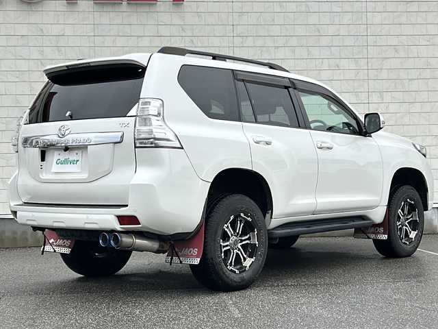 トヨタ ランドクルーザー プラド TX 富山県 2016(平28)年 6.3万km ホワイトパールクリスタルシャイン 〇4WD/〇ムーンルーフ/〇純正ナビ/〇フルセグTV/〇バックモニター/〇ビルトインETC/〇ドライブレコーダー/〇クリアランスソナー/〇横滑り防止装置/〇純正LEDヘッドランプ/〇オートライト/〇オートエアコン/〇ベージュファブリックシート/〇レーザーレーダー探知機/〇社外17インチアルミホイール/〇スマートキー/〇プッシュエンジンスタート/〇禁煙車