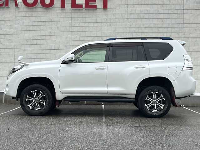 トヨタ ランドクルーザー プラド TX 富山県 2016(平28)年 6.3万km ホワイトパールクリスタルシャイン 〇4WD/〇ムーンルーフ/〇純正ナビ/〇フルセグTV/〇バックモニター/〇ビルトインETC/〇ドライブレコーダー/〇クリアランスソナー/〇横滑り防止装置/〇純正LEDヘッドランプ/〇オートライト/〇オートエアコン/〇ベージュファブリックシート/〇レーザーレーダー探知機/〇社外17インチアルミホイール/〇スマートキー/〇プッシュエンジンスタート/〇禁煙車