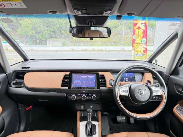 ホンダ フィット e:HEVリュクス 大阪府 2020(令2)年 6.5万km プレミアムグラマラスブロンズP /禁煙車//衝突被害軽減ブレーキ//純正8インチSDナビ/VXM-205VFEi//Bluetooth/CD/DVD/USB//フルセグテレビ//バックカメラ//前後純正ドライブレコーダー/DRH-204VD//前後コーナーセンサー//アダクティブクルーズコントロール//前席シートヒーター//16インチ純正アルミホイール//ドアバイザー//ETC//スペアキー×1