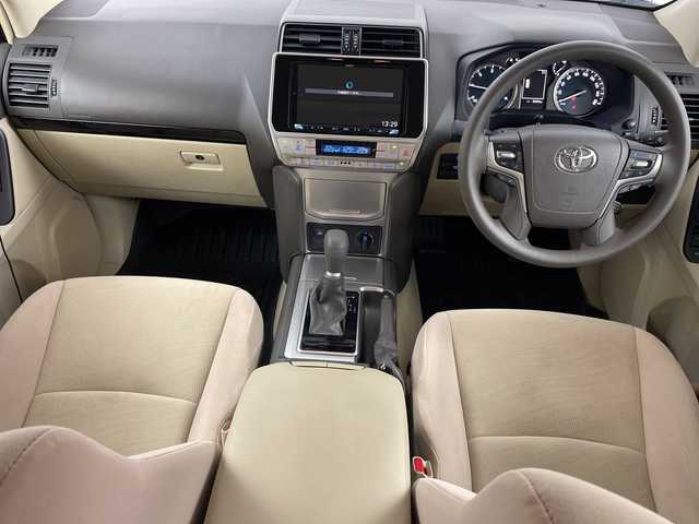 トヨタ ランドクルーザー プラド TX 道央・札幌 2022(令4)年 3.7万km ホワイトパールクリスタルシャイン ・４WD　/ ディーゼルターボ/・ムーンルーフ/7人乗り/・トヨタセーフティセンス/・プリクラッシュセーフティ/・レーダークルーズコントロール/・ケンウッド9インチ　ナビ/・DVD.CD.SD.BT.フルセグ/・HIDMI/バックカメラ」/・社外ドライブレコーダー/・ビルトインETC/・リア　ランゲージマット/・スマートキー