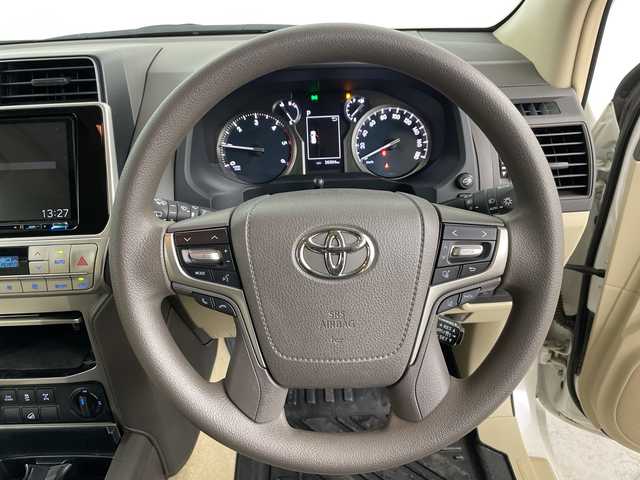 トヨタ ランドクルーザー プラド TX 道央・札幌 2022(令4)年 3.7万km ホワイトパールクリスタルシャイン ・４WD　/ ディーゼルターボ/・ムーンルーフ/7人乗り/・トヨタセーフティセンス/・プリクラッシュセーフティ/・レーダークルーズコントロール/・ケンウッド9インチ　ナビ/・DVD.CD.SD.BT.フルセグ/・HIDMI/バックカメラ」/・社外ドライブレコーダー/・ビルトインETC/・リア　ランゲージマット/・スマートキー