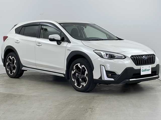 スバル ＸＶ ハイブリッド アドバンス 道央・札幌 2021(令3)年 2.4万km クリスタルホワイトP ・4WD/・純正ナビ/CD/DVD/BT/ブルーレイ/HDMI/フルセグ/USB/・バックカメラ/・アイサイトver3/・衝突軽減ブレーキ/・オートクルーズコントロール/・アクティブレーンキープアシスト/・誤発進抑制機能/・ふらつき警報/・先行車発進お知らせ/・後退時ブレーキアシスト/・ブラインドスポットモニター/・パドルシフト/・X-MODE/・前席パワーシート/・運転席メモリーシート/・ステアリングリモコン/・オートブレーキホールド/・純正フロアマット/・ドアバイザー/・LEDヘッドライト/・フォグランプ/・リアフォグランプ/・ETC/・スマートキー/・スペアキー/・純正18インチAW