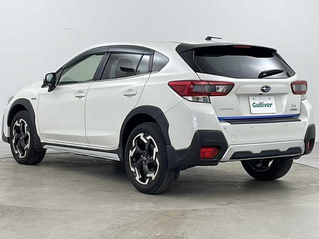 スバル ＸＶ ハイブリッド アドバンス 道央・札幌 2021(令3)年 2.4万km クリスタルホワイトP ・4WD/・純正ナビ/CD/DVD/BT/ブルーレイ/HDMI/フルセグ/USB/・バックカメラ/・アイサイトver3/・衝突軽減ブレーキ/・オートクルーズコントロール/・アクティブレーンキープアシスト/・誤発進抑制機能/・ふらつき警報/・先行車発進お知らせ/・後退時ブレーキアシスト/・ブラインドスポットモニター/・パドルシフト/・X-MODE/・前席パワーシート/・運転席メモリーシート/・ステアリングリモコン/・オートブレーキホールド/・純正フロアマット/・ドアバイザー/・LEDヘッドライト/・フォグランプ/・リアフォグランプ/・ETC/・スマートキー/・スペアキー/・純正18インチAW