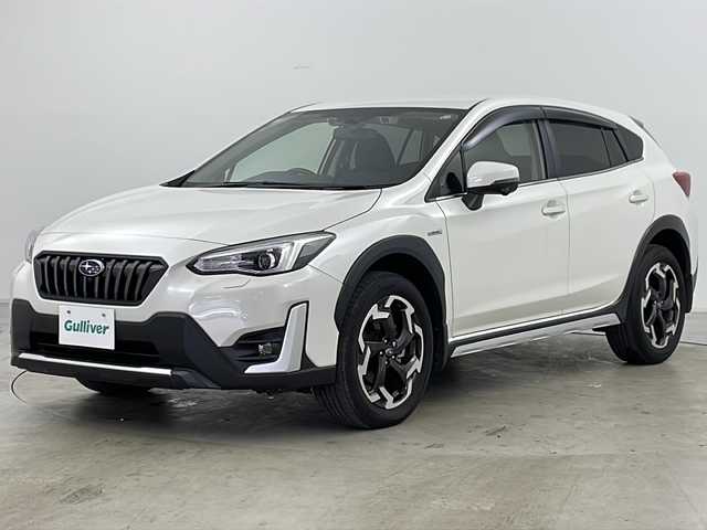 スバル ＸＶ ハイブリッド アドバンス 道央・札幌 2021(令3)年 2.4万km クリスタルホワイトP ・4WD/・純正ナビ/CD/DVD/BT/ブルーレイ/HDMI/フルセグ/USB/・バックカメラ/・アイサイトver3/・衝突軽減ブレーキ/・オートクルーズコントロール/・アクティブレーンキープアシスト/・誤発進抑制機能/・ふらつき警報/・先行車発進お知らせ/・後退時ブレーキアシスト/・ブラインドスポットモニター/・パドルシフト/・X-MODE/・前席パワーシート/・運転席メモリーシート/・ステアリングリモコン/・オートブレーキホールド/・純正フロアマット/・ドアバイザー/・LEDヘッドライト/・フォグランプ/・リアフォグランプ/・ETC/・スマートキー/・スペアキー/・純正18インチAW