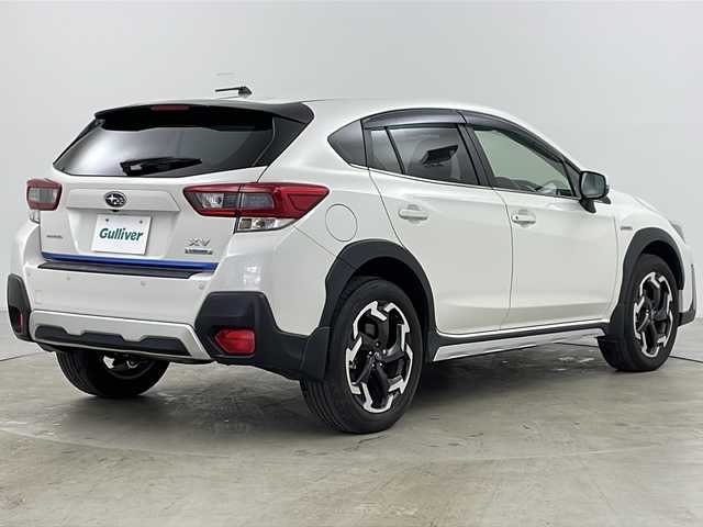 スバル ＸＶ ハイブリッド アドバンス 道央・札幌 2021(令3)年 2.4万km クリスタルホワイトP ・4WD/・純正ナビ/CD/DVD/BT/ブルーレイ/HDMI/フルセグ/USB/・バックカメラ/・アイサイトver3/・衝突軽減ブレーキ/・オートクルーズコントロール/・アクティブレーンキープアシスト/・誤発進抑制機能/・ふらつき警報/・先行車発進お知らせ/・後退時ブレーキアシスト/・ブラインドスポットモニター/・パドルシフト/・X-MODE/・前席パワーシート/・運転席メモリーシート/・ステアリングリモコン/・オートブレーキホールド/・純正フロアマット/・ドアバイザー/・LEDヘッドライト/・フォグランプ/・リアフォグランプ/・ETC/・スマートキー/・スペアキー/・純正18インチAW