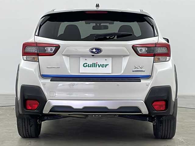 スバル ＸＶ ハイブリッド アドバンス 道央・札幌 2021(令3)年 2.4万km クリスタルホワイトP ・4WD/・純正ナビ/CD/DVD/BT/ブルーレイ/HDMI/フルセグ/USB/・バックカメラ/・アイサイトver3/・衝突軽減ブレーキ/・オートクルーズコントロール/・アクティブレーンキープアシスト/・誤発進抑制機能/・ふらつき警報/・先行車発進お知らせ/・後退時ブレーキアシスト/・ブラインドスポットモニター/・パドルシフト/・X-MODE/・前席パワーシート/・運転席メモリーシート/・ステアリングリモコン/・オートブレーキホールド/・純正フロアマット/・ドアバイザー/・LEDヘッドライト/・フォグランプ/・リアフォグランプ/・ETC/・スマートキー/・スペアキー/・純正18インチAW