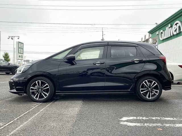 ホンダ フィット e:HEV RS 徳島県 2023(令5)年 1.2万km クリスタルブラックパール e:HEV（ハイブリッド）/FF/MTモード付フロアCVT/純正 Honda Connect対応 9インチナビ/（FM/AM/USB/Bluetooth/TV/CarPlay/AndroidAuto）/バックカメラ/ドライブレコーダー 前後/ビルトイン ETC2.0/Honda SENSING/・衝突軽減ブレーキ［CMBS］/・車線維持支援システム［LKAS］/・アダプティブクルーズコントロール［ACC］/・路外逸脱抑制機能/・先行車発進お知らせ機能/・標識認識機能/・踏み間違い衝突軽減システム/・パーキングセンサーシステム（前後）/・オートハイビーム機能/装備/・ハーフレザーシート/・パドルシフト/・オートエアコン/・オートライト/・LEDヘッドライト/・電子パーキングブレーキ/・ブレーキホールド機能/・ステアリングスイッチ/・プッシュスタート/・USBジャック（充電x1＋2、入力x1）/・後席チップアップ機能/・電動格納ドアミラー/・革巻きステアリング（ゴールドステッチ入）/・純正 16inAW/・保/取/ナビ取/・スマートキーx2