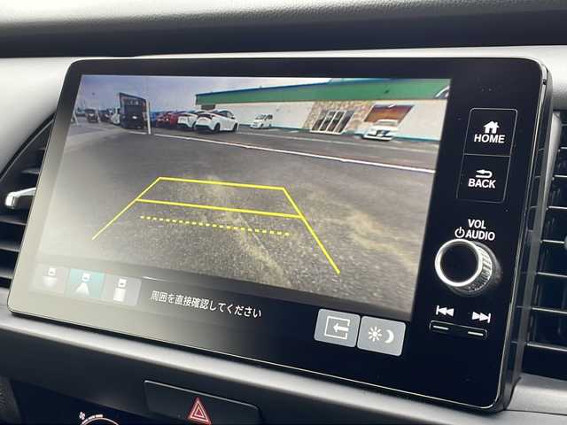 ホンダ フィット e:HEV RS 徳島県 2023(令5)年 1.2万km クリスタルブラックパール e:HEV（ハイブリッド）/FF/MTモード付フロアCVT/純正 Honda Connect対応 9インチナビ/（FM/AM/USB/Bluetooth/TV/CarPlay/AndroidAuto）/バックカメラ/ドライブレコーダー 前後/ビルトイン ETC2.0/Honda SENSING/・衝突軽減ブレーキ［CMBS］/・車線維持支援システム［LKAS］/・アダプティブクルーズコントロール［ACC］/・路外逸脱抑制機能/・先行車発進お知らせ機能/・標識認識機能/・踏み間違い衝突軽減システム/・パーキングセンサーシステム（前後）/・オートハイビーム機能/装備/・ハーフレザーシート/・パドルシフト/・オートエアコン/・オートライト/・LEDヘッドライト/・電子パーキングブレーキ/・ブレーキホールド機能/・ステアリングスイッチ/・プッシュスタート/・USBジャック（充電x1＋2、入力x1）/・後席チップアップ機能/・電動格納ドアミラー/・革巻きステアリング（ゴールドステッチ入）/・純正 16inAW/・保/取/ナビ取/・スマートキーx2