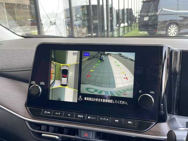 日産 オーラ G  90周年記念車 愛知県 2024(令6)年 1万km ミッドナイトブラック/サンライズカッパー プロパイロット/衝突被害軽減ブレーキ/BOSEプレミアムサウンド/純正8インチディスプレイオーディオナビ（あり）/全方位カメラ/レーダークルーズコントロール/シートヒーター/フルセグTV/Bluetooth/バックカメラ/コーナーセンサー/純正アルミホイール/ETC2.0/ブラインドスポットモニター/LEDヘッドライト/ステアリングヒーター/インテリジェントミラー/オートマチックハイビーム/置くだけ充電器/ステアリングスイッチ/スマートキー/プッシュスタート