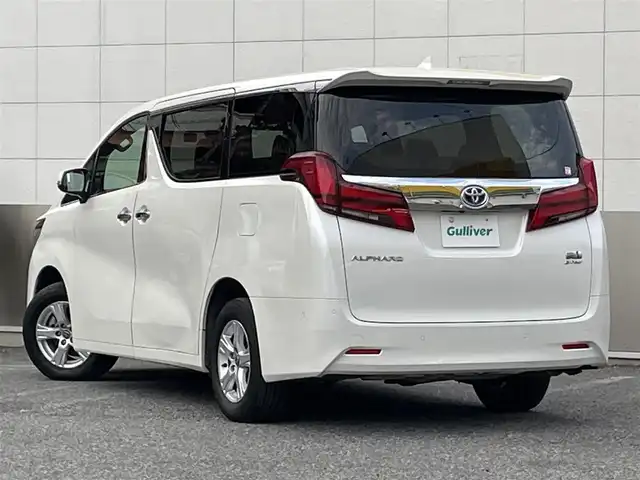 トヨタ アルファードハイブリット X 東京都 2021(令3)年 4.7万km ホワイトパールクリスタルシャイン ワンオーナー/ツインムーンルーフ/JBLプレミアムサウンド/純正10.5インチワイドSDナビ/　DVD/CD/Bluetooth/13.3インチリアエンターテインメント/パノラミックビューモニター/デジタルインナーミラー/ブラインドスポットモニター/前後ドライブレコーダー/両側パワースライドドア/プリクラッシュセーフティ/レーダークルーズコントロール/レーントレーシングアシスト/ロードサインアシスト/LEDヘッドライト/LEDフォグランプ/オートライト/オートマチックハイビーム/ビルトインETC2.0/純正16インチアルミホイール/革巻きステアリングホイール/ステアリングスイッチ/パーキングサポートブレーキ/AC100V/電動オート格納ミラー/ウインカーミラー/プッシュスタート/スマートキー/横すべり防止/純正フロアマット/保証書/取扱説明書
