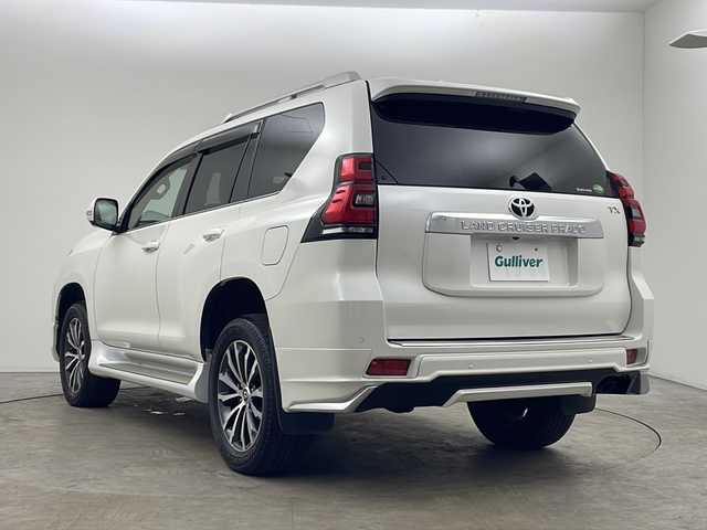 トヨタ ランドクルーザー プラド TX Lパッケージ 秋田県 2018(平30)年 2.8万km ホワイトパールクリスタルシャイン ４WD/純正ナビ【AM/FM/BT/CD/DVD】 /バックカメラ /フルセグTV/ETC2.0/ フロントモデリスタエアロ /サンルーフ /前席パワーシート /衝突被害軽減システム /フロントワイパーデアイサー /横滑り防止装置 /レーンキープアシスト/ヒルディセントコントロール/ダウンヒルアシストコントロール/スマートキー /プッシュスタート/オートエアコン/クリアランスソナー/クルーズコントロール/オートライト/ステアリングリモコン/電格ミラー/革巻きステアリング/ウィンカーミラー/純正フロアマット/ルーフレール/コーナーセンサー/フォグライト/保証書/取り扱い説明書