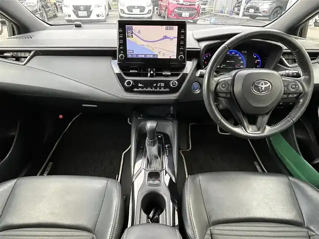 トヨタ カローラツーリング ハイブリッド ダブルバイビー 島根県 2021(令3)年 7万km ホワイトパールクリスタルシャイン 登録時走行距離　69594km/純正ナビ/Bluetooth/バックカメラ/レーダークルーズコントロール/電動パーキング/電動格納ミラー/コーナーセンサー/オートハイビーム/シートヒーター（DN席）/ステアリングヒーター/ステアリングスイッチ/スマートキー/スペアキー/レーントレーシングアシスト/プリクラッシュセーフティシステム/パーキングサポートブレーキ/ロードサインアシスト/純正フロアマット/ビルドインETC2.0/ドライブレコーダー前後/純正アルミ１７インチ