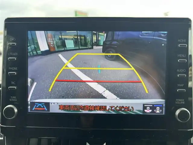 トヨタ カローラツーリング ハイブリッド ダブルバイビー 島根県 2021(令3)年 7万km ホワイトパールクリスタルシャイン 登録時走行距離　69594km/純正ナビ/Bluetooth/バックカメラ/レーダークルーズコントロール/電動パーキング/電動格納ミラー/コーナーセンサー/オートハイビーム/シートヒーター（DN席）/ステアリングヒーター/ステアリングスイッチ/スマートキー/スペアキー/レーントレーシングアシスト/プリクラッシュセーフティシステム/パーキングサポートブレーキ/ロードサインアシスト/純正フロアマット/ビルドインETC2.0/ドライブレコーダー前後/純正アルミ１７インチ