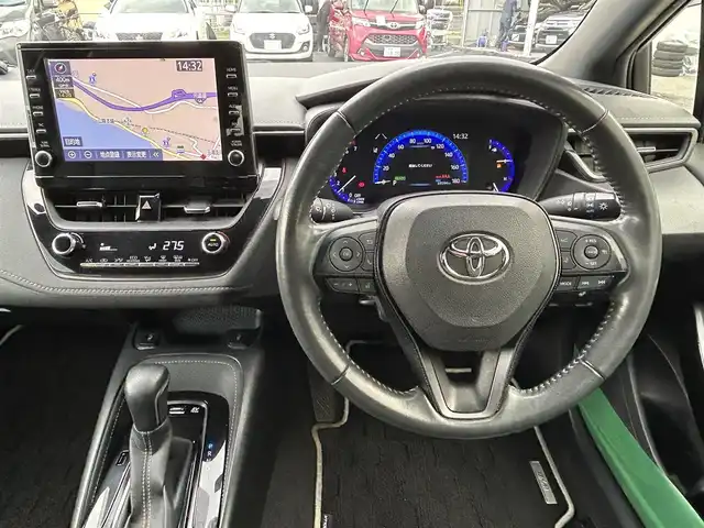 トヨタ カローラツーリング ハイブリッド ダブルバイビー 島根県 2021(令3)年 7万km ホワイトパールクリスタルシャイン 登録時走行距離　69594km/純正ナビ/Bluetooth/バックカメラ/レーダークルーズコントロール/電動パーキング/電動格納ミラー/コーナーセンサー/オートハイビーム/シートヒーター（DN席）/ステアリングヒーター/ステアリングスイッチ/スマートキー/スペアキー/レーントレーシングアシスト/プリクラッシュセーフティシステム/パーキングサポートブレーキ/ロードサインアシスト/純正フロアマット/ビルドインETC2.0/ドライブレコーダー前後/純正アルミ１７インチ