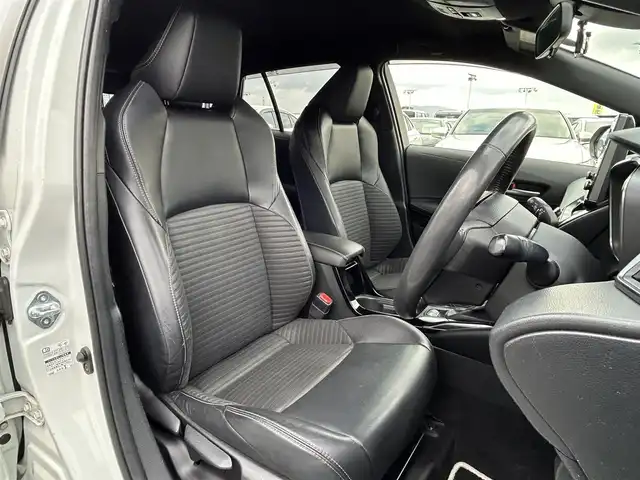 トヨタ カローラツーリング ハイブリッド ダブルバイビー 島根県 2021(令3)年 7万km ホワイトパールクリスタルシャイン 登録時走行距離　69594km/純正ナビ/Bluetooth/バックカメラ/レーダークルーズコントロール/電動パーキング/電動格納ミラー/コーナーセンサー/オートハイビーム/シートヒーター（DN席）/ステアリングヒーター/ステアリングスイッチ/スマートキー/スペアキー/レーントレーシングアシスト/プリクラッシュセーフティシステム/パーキングサポートブレーキ/ロードサインアシスト/純正フロアマット/ビルドインETC2.0/ドライブレコーダー前後/純正アルミ１７インチ