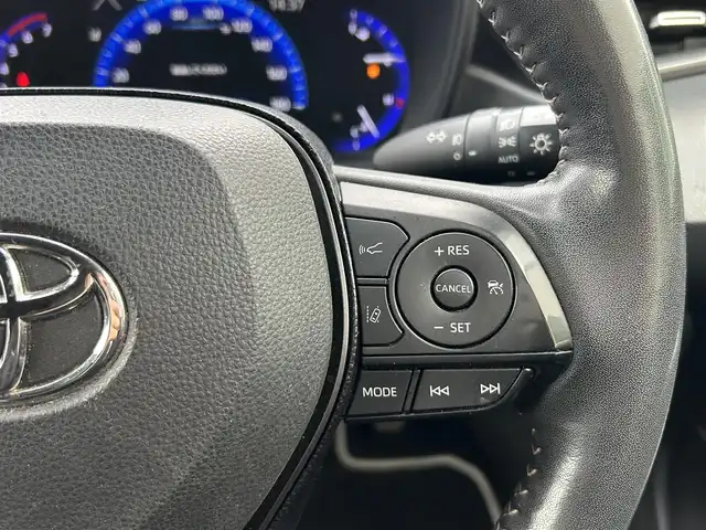 トヨタ カローラツーリング ハイブリッド ダブルバイビー 島根県 2021(令3)年 7万km ホワイトパールクリスタルシャイン 登録時走行距離　69594km/純正ナビ/Bluetooth/バックカメラ/レーダークルーズコントロール/電動パーキング/電動格納ミラー/コーナーセンサー/オートハイビーム/シートヒーター（DN席）/ステアリングヒーター/ステアリングスイッチ/スマートキー/スペアキー/レーントレーシングアシスト/プリクラッシュセーフティシステム/パーキングサポートブレーキ/ロードサインアシスト/純正フロアマット/ビルドインETC2.0/ドライブレコーダー前後/純正アルミ１７インチ