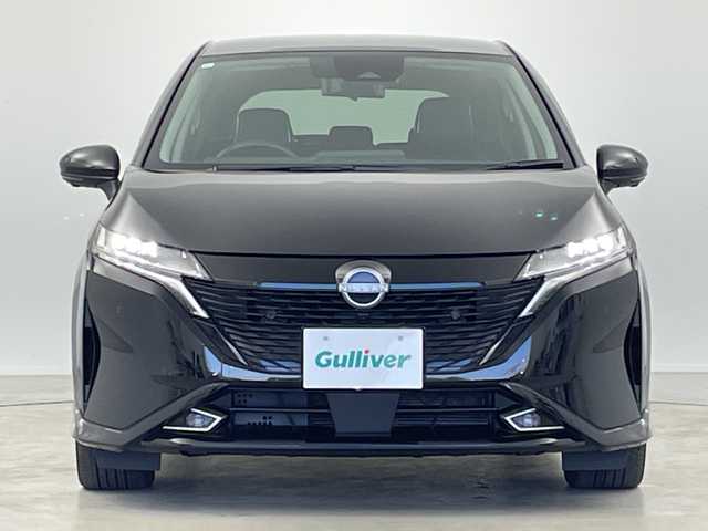 日産 オーラ G レザーエディション 岐阜県 2023(令5)年 2.3万km 黒 純正ナビ（MOP）/・フルセグ/・Bluetooth/プロパイロット/アラウンドビューモニター/ブラインドスポットモニター/前席シートヒーター/ステアリングヒーター/デジタルインナーミラー/置くだけ充電/LEDライト/オートハイビーム/スマートキー/プッシュスタート