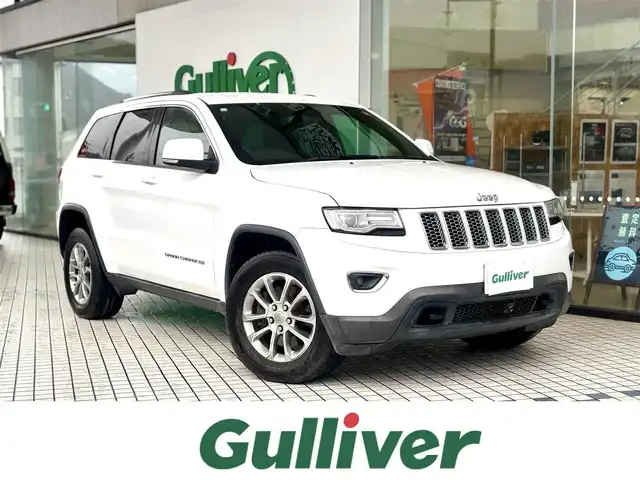 クライスラー・ジープ ジープ グランドチェロキー ラレード 京都府 2015(平27)年 7.2万km 白 純正メモリーナビ、地デジ、Bluetooth/バックカメラ/パドルシフト/前席パワーシート/USB端子、AUX端子/オートライト/ディスチャージ/クルーズコントロール/ETC/ドライブレコーダー