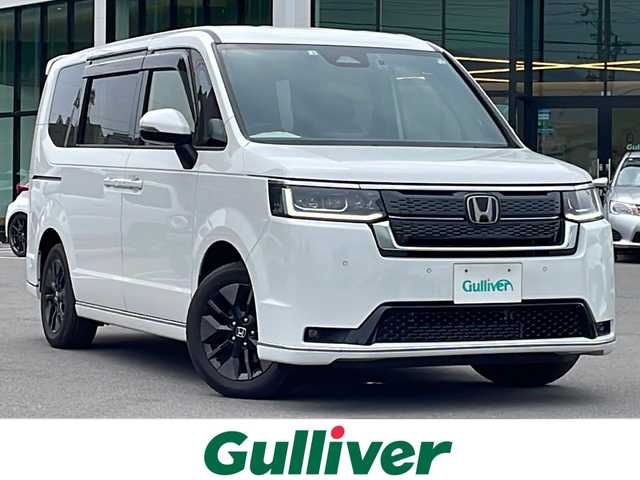 ホンダ ステップワゴン 長野県 2022(令4)年 1.3万km パール 福祉車両　/両側電動ドア　/電動リアゲート　/プッシュスタート　/寒冷地仕様　/後席エアコン　/追従クルーズコントロール　/Bluetooth　/後席モニター　/ＵＳＢ入力端子　/バックカメラ　/フルセグTV　/ドラレコ/三列シート/ウォークスルー/ハーフレザーシート/レーンキープアシスト/衝突被害軽減装置/純正アルミ冬タイヤ車載/前後コーナーセンサー