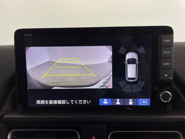 ホンダ フリード ハイブリット e:HEV AIR EX 鹿児島県 2025(令7)年 0.1千km メテオロイドグレーメタリック 登録済未使用車/2列目キャプテンシート/ホンダセンシング/●衝突軽減ブレーキ（CMBS）/●先行車発進お知らせ機能/●歩行者事故低減ステアリング/●路外逸脱抑制機能/●標識認識機能/●渋滞追従機能付アダプティブクルーズコントロール（ACC）/●車線維持支援システム（LKAS）/●誤発進抑制機能/●後方誤発進抑制機能/●近距離衝突軽減ブレーキ/●急アクセル抑制機能/●前後コーナーセンサー/●パーキングセンサーシステム/コンフォートビューパッケージ/純正9インチナビ/・Bluetooth・フルセグTV/バックカメラ/両側パワースライドドア/革巻きステアリング/LEDヘッドランプ/フォグランプ/オートライト/スマートキー＆プッシュスタート/スペアキー/電動格納ミラー/ルーフレール/純正15インチAW/保証書/取扱説明書