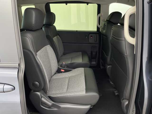 ホンダ フリード ハイブリット e:HEV AIR EX 鹿児島県 2025(令7)年 0.1千km メテオロイドグレーメタリック 登録済未使用車/2列目キャプテンシート/ホンダセンシング/●衝突軽減ブレーキ（CMBS）/●先行車発進お知らせ機能/●歩行者事故低減ステアリング/●路外逸脱抑制機能/●標識認識機能/●渋滞追従機能付アダプティブクルーズコントロール（ACC）/●車線維持支援システム（LKAS）/●誤発進抑制機能/●後方誤発進抑制機能/●近距離衝突軽減ブレーキ/●急アクセル抑制機能/●前後コーナーセンサー/●パーキングセンサーシステム/コンフォートビューパッケージ/純正9インチナビ/・Bluetooth・フルセグTV/バックカメラ/両側パワースライドドア/革巻きステアリング/LEDヘッドランプ/フォグランプ/オートライト/スマートキー＆プッシュスタート/スペアキー/電動格納ミラー/ルーフレール/純正15インチAW/保証書/取扱説明書