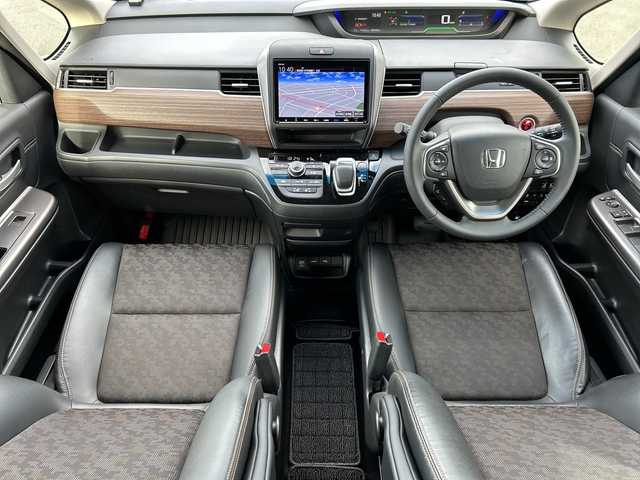 ホンダ フリード＋ ハイブリット クロスター ホンダセンシング 青森県 2022(令4)年 3.3万km スーパープラチナグレーメタリック 4WD/寒冷地仕様/純正9インチメモリナビ・フルセグTV/CD・DVD・Bluetooth・USB・SD・HDMI/バックカメラ/両側パワースライドドア/合皮コンビシート/前席シートヒーター/ホンダセンシング/衝突軽減ブレーキ/追従クルーズコントロール/車線維持支援システム/ドライブレコーダー/ワイパーデアイサー/ビルトインETC/後席ロールサンシェード/LEDヘッドライト/オートライト/LEDフォグランプ/純正15インチアルミ/シルバールーフレール