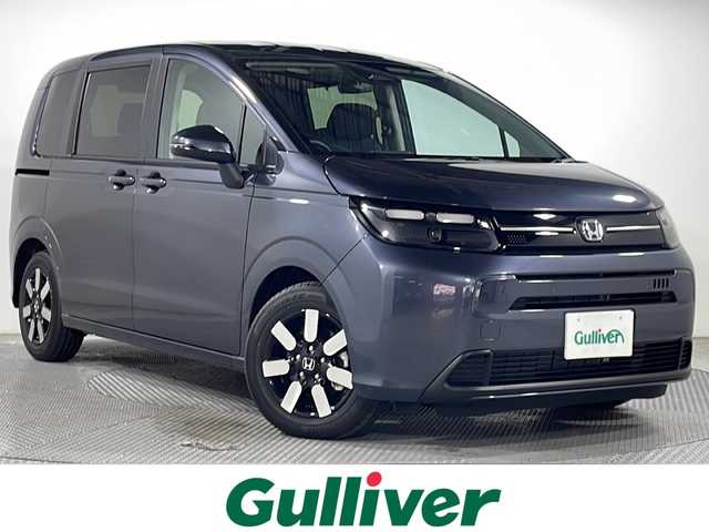 ホンダ フリード ハイブリット e:HEV AIR EX 広島県 2025(令7)年 0.1千km メテオロイドグレーメタリック 登録済未使用車/純正９型ナビ/・ＣａｒＰｌａｙ/・android auto/・フルセグテレビ/バックカメラ/レーダークルーズコントロール/シートヒーターD+N/両側パワースライドドア/ハーフレザー/コーナーセンサー　　/ブラインドスポットモニター/スペアキー