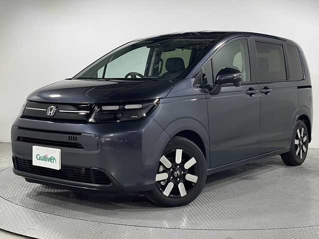 ホンダ フリード ハイブリット e:HEV AIR EX 広島県 2025(令7)年 0.1千km メテオロイドグレーメタリック 登録済未使用車/純正９型ナビ/・ＣａｒＰｌａｙ/・android auto/・フルセグテレビ/バックカメラ/レーダークルーズコントロール/シートヒーターD+N/両側パワースライドドア/ハーフレザー/コーナーセンサー　　/ブラインドスポットモニター/スペアキー