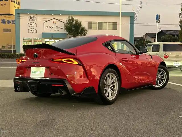 トヨタ スープラ SZ 愛媛県 2022(令4)年 5.1万km プロミネンスレッド 純正ナビ/BT/AM・FM/フルセグTV/アダプティブクルーズコントロール/前方ドライブレコーダー/ETC/全方位カメラ/LEDヘッドライト/オートマチックハイビーム/純正アルミホイール/スペアキー/GR SPORT/ブラインドスポットモニター