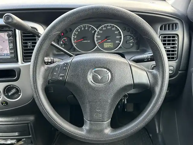 マツダ トリビュート FB－X 岡山県 2005(平17)年 15.4万km パッションオレンジマイカ 登録時走行距離153809/純正DVDナビ/AM/FM/TV/CD/バックカメラ/純正フロアマット/ステアリングスイッチ/ドライブレコーダー一体型デジタルインナーミラー/純正16インチAW/ETC