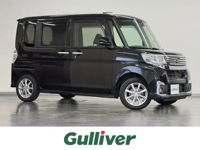 ダイハツ タント カスタム X SA Ⅲ 三重県 2018(平30)年 1.9万km ブラックマイカメタリック ガソリン/FF/インパネCVT/ストラーダ 7インチナビ CN-RE04WD/（AM/FM/TV/iPod/USB/SD/Bluetooth/AUX/VTR）/片側パワースライドドア/ETC/スマートアシスト3/・衝突警報機能（対車両・対歩行者）/・衝突回避支援ブレーキ（対車両・対歩行者）/・車線逸脱警報/・誤発進抑制制御機能（前方・後方）/・オートハイビーム機能/・SRS サイドエアバッグシステム/装備/・シートヒーター（D）/・オートエアコン/・オートライト/・LED ヘッドランプ＆フロントフォグランプ/・プッシュスタート/・電動格納ドアミラー/・純正14inAW/・ナビ取