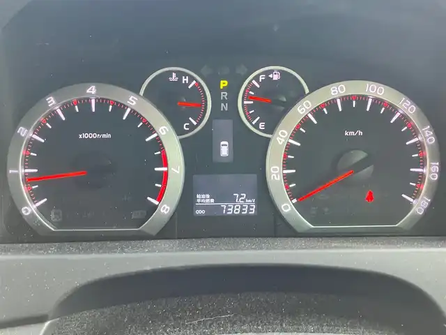 トヨタ ヴェルファイア 2．4Z プラチナセレクションⅡ 静岡県 2011(平23)年 7.4万km 黒 エンジンスタートボタン/パワーステアリング/パワーウィンドウ/スマートキー/Wオートエアコン/スペアキー１本/フリップダウンモニター/ETC/8インチナビ（CD/DVD/BT/フルセグ）/三列シート/オットマン/電動リアゲート/ウォークスルー/フロアマット/両側パワースライドドア/純正アルミホイール/ABS/横滑り防止装置/コーナーセンサー前後/オートライト/W＋サイドエアバック/カーテンエアバック