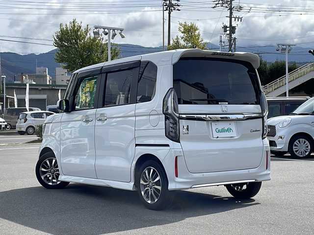 ホンダ Ｎ ＢＯＸ カスタム L 長野県 2021(令3)年 1.7万km プラチナホワイトパール 純正８インチメモリナビ/BluetoothAudio/DVD再生可能/フルセグTV/純正前後ドライブレコーダー/バックカメラ/両側パワースライドドア/前席シートヒーター/革巻きステアリング/ステアリングスイッチ/LEDヘッドランプ/フォグランプ/オートライト/スマートキー/プッシュスタート/電動格納ミラー/純正14インチAW/純正フロアマット/ホンダセンシング/衝突軽減ブレーキ/車線維持支援システム/アダプティブクルーズコントロール/コーナーセンサー