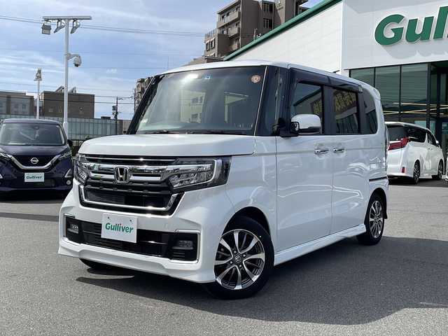 ホンダ Ｎ ＢＯＸ カスタム L 長野県 2021(令3)年 1.7万km プラチナホワイトパール 純正８インチメモリナビ/BluetoothAudio/DVD再生可能/フルセグTV/純正前後ドライブレコーダー/バックカメラ/両側パワースライドドア/前席シートヒーター/革巻きステアリング/ステアリングスイッチ/LEDヘッドランプ/フォグランプ/オートライト/スマートキー/プッシュスタート/電動格納ミラー/純正14インチAW/純正フロアマット/ホンダセンシング/衝突軽減ブレーキ/車線維持支援システム/アダプティブクルーズコントロール/コーナーセンサー