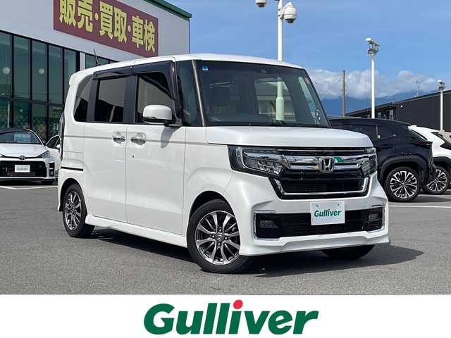 ホンダ Ｎ ＢＯＸ カスタム L 長野県 2021(令3)年 1.7万km プラチナホワイトパール 純正８インチメモリナビ/BluetoothAudio/DVD再生可能/フルセグTV/純正前後ドライブレコーダー/バックカメラ/両側パワースライドドア/前席シートヒーター/革巻きステアリング/ステアリングスイッチ/LEDヘッドランプ/フォグランプ/オートライト/スマートキー/プッシュスタート/電動格納ミラー/純正14インチAW/純正フロアマット/ホンダセンシング/衝突軽減ブレーキ/車線維持支援システム/アダプティブクルーズコントロール/コーナーセンサー