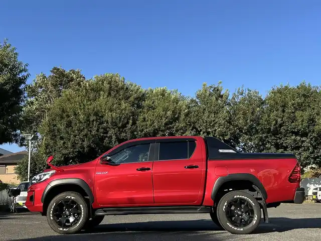 トヨタ ハイラックス Z ブラックラリーエディション 東京都 2019(平31)年 4.5万km クリムゾンスパークレッドM ワンオーナー/2インチリフトアップ/タイ・トヨタ製ベッドライナー/CARRYBOYS製電動トノカバー(CB796)/KENWOOD製9インチフローティングナビ/フルセグTV/DVD再生/Bluetoothオーディオ/バックカメラ/ETC2.0/Clazzio製シートカバー/コムテック製ドライブレコーダー(ZDR026)/ボンネットプロテクター/サイドステップ/LEDヘッドランプ/LEDフォグランプ/スマートキー×2