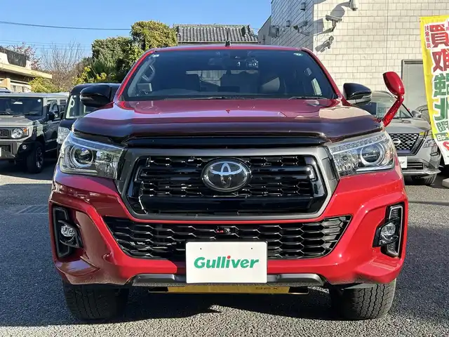 トヨタ ハイラックス Z ブラックラリーエディション 東京都 2019(平31)年 4.5万km クリムゾンスパークレッドM ワンオーナー/2インチリフトアップ/タイ・トヨタ製ベッドライナー/CARRYBOYS製電動トノカバー(CB796)/KENWOOD製9インチフローティングナビ/フルセグTV/DVD再生/Bluetoothオーディオ/バックカメラ/ETC2.0/Clazzio製シートカバー/コムテック製ドライブレコーダー(ZDR026)/ボンネットプロテクター/サイドステップ/LEDヘッドランプ/LEDフォグランプ/スマートキー×2