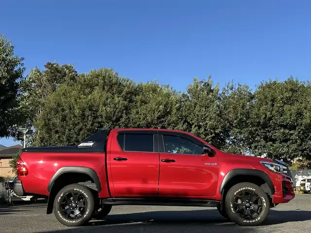 トヨタ ハイラックス Z ブラックラリーエディション 東京都 2019(平31)年 4.5万km クリムゾンスパークレッドM ワンオーナー/2インチリフトアップ/タイ・トヨタ製ベッドライナー/CARRYBOYS製電動トノカバー(CB796)/KENWOOD製9インチフローティングナビ/フルセグTV/DVD再生/Bluetoothオーディオ/バックカメラ/ETC2.0/Clazzio製シートカバー/コムテック製ドライブレコーダー(ZDR026)/ボンネットプロテクター/サイドステップ/LEDヘッドランプ/LEDフォグランプ/スマートキー×2