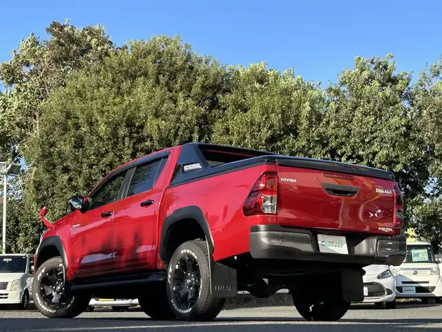 トヨタ ハイラックス Z ブラックラリーエディション 東京都 2019(平31)年 4.5万km クリムゾンスパークレッドM ワンオーナー/2インチリフトアップ/タイ・トヨタ製ベッドライナー/CARRYBOYS製電動トノカバー(CB796)/KENWOOD製9インチフローティングナビ/フルセグTV/DVD再生/Bluetoothオーディオ/バックカメラ/ETC2.0/Clazzio製シートカバー/コムテック製ドライブレコーダー(ZDR026)/ボンネットプロテクター/サイドステップ/LEDヘッドランプ/LEDフォグランプ/スマートキー×2