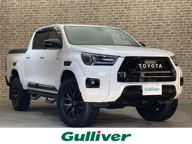 トヨタ ハイラックス Z GRスポーツ 岩手県 2022(令4)年 4.3万km スーパーホワイトⅡ パートタイム４WD/ディーゼルターボ/ハードトノカバー/パノラミックビューモニター/専用エクステリア・インテリア/レッド塗装GRロゴ入りブレーキキャリパー/BATTLEZリフトアップスプリング(フロント)/RAYSチームデイトナ１７インチアルミホイール/パドルシフト/オートLSD/アクティブトラクションコントロール/ダウンヒルアシストコントロール/ヒルスタートアシストコントロール/リヤデフロック/クリアランスソナー/プリクラッシュセーフティ/レーダークルーズコントロール/レーンディパーチャーアラート/ロードサインアシスト/アイドリングストップ/専用シート/運転席パワーシート/純正ディスプレイオーディオ/ナビゲーション/AppleCarPlay・AndroidAuto/ミラー型ドライブレコーダー/ETC2.0/LEDヘッドランプ/フロント・リヤフォグランプ