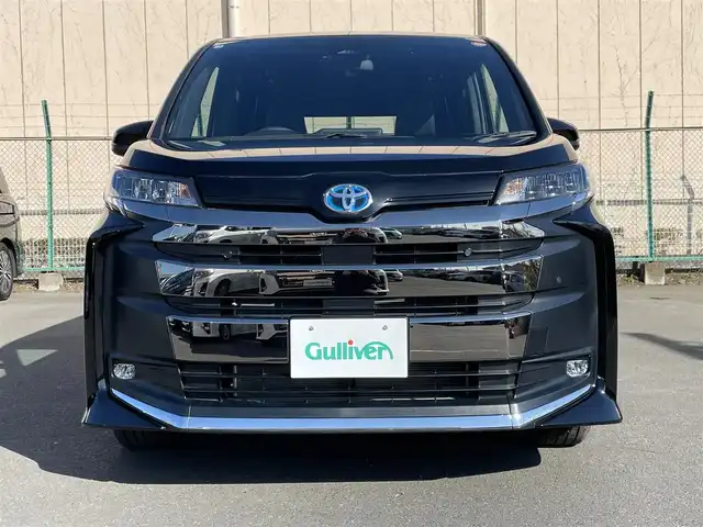 トヨタ ノア ハイブリッド S－Z 東京都 2025(令7)年 0.1万km イナズマスパーキングブラックガラスフレーク 純正８型ディスプレィオーディオ/・BluetoothAudio/USB/HDMI/・AppleCarPlay/AndoidAuto/レーダークルーズコントロール /両側パワースライドドア /LEDヘッドライト /コーナセンサー /フリーストップバックドア /オートマチックハイビーム /セーフティセンス　/・プリクラシュセーフティ/・レーンディパーチャーアラート/・オートマチックハイビーム/・レーダークルーズコントロール/・発進遅れ告知機能/・レーントレーシングアシスト/パーキングサポートブレーキ/ブラック合皮ファブリックコンビシート/・キャプテンシート/バックガイドモニター/ビルトインETC/純正フロアマット