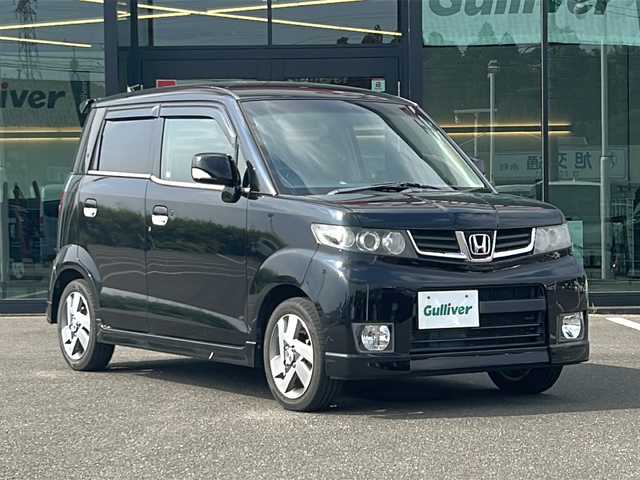 ホンダ ゼスト スパーク W 鹿児島県 2012(平24)年 10.9万km 黒 社外ナビ/Bluetooth/TV/電動格納ミラー/純正フロアマット/ドアバイザー/オートエアコン/パワーウィンドウ/純正AW/ベンチシート/保証書/取扱説明書/スマートキー
