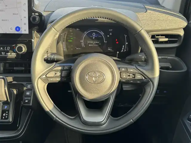 トヨタ シエンタ ハイブリッド Z 愛媛県 2023(令5)年 3.7万km ベージュ ワンオーナー/プッシュスタート/純正メーカーナビ（AM/FM/USB/フルセグTV/Bluetooth）/バックカメラ/両側パワースライドドア/ETC2.0/クルーズコントロール/オートライト/オートマチックハイビーム/アイドリングストップ/横滑り防止装置/AAC/ステアリングスイッチ