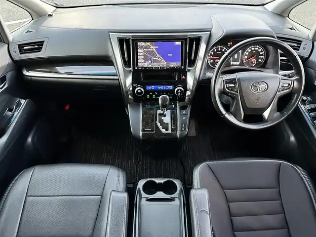 トヨタ アルファード S 山形県 2016(平28)年 11.4万km ブラック 登録時走行距離114775Km/保証書/取扱説明書/後席モニター（ALPINE）/社外SDナビ（ALPINE）/フルセグTV/黒革シートカバー/両側パワースライドドア/前後コーナーセンサー/トヨタセーフティセンス/7人乗り/オットマン/バックカメラ/LEDヘッドライト/ウィンカーミラー/電動格納ミラー/ETC/プッシュスタート/スタッドレスタイヤ車載