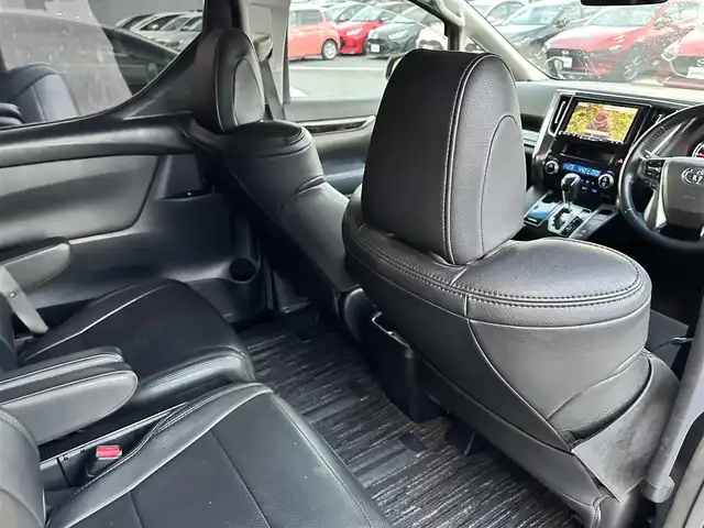 トヨタ アルファード S 山形県 2016(平28)年 11.4万km ブラック 登録時走行距離114775Km/保証書/取扱説明書/後席モニター（ALPINE）/社外SDナビ（ALPINE）/フルセグTV/黒革シートカバー/両側パワースライドドア/前後コーナーセンサー/トヨタセーフティセンス/7人乗り/オットマン/バックカメラ/LEDヘッドライト/ウィンカーミラー/電動格納ミラー/ETC/プッシュスタート/スタッドレスタイヤ車載