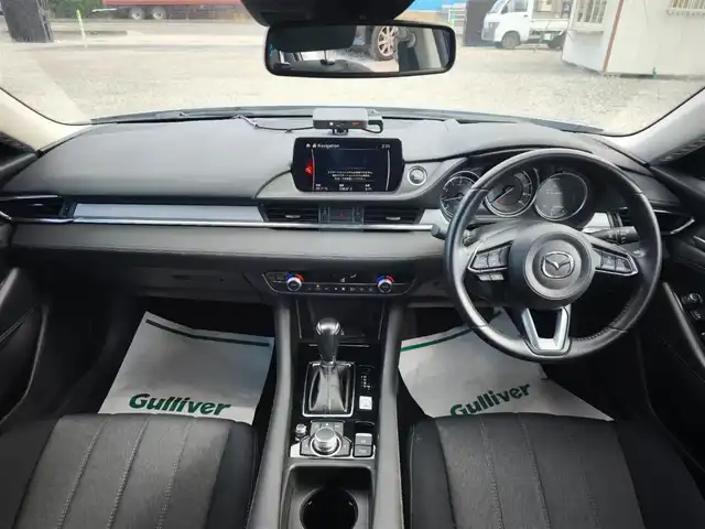 マツダ マツダ６セダン 20S 愛媛県 2019(令1)年 5.4万km ソニックシルバーM 純正8型ナビ/バックモニター/ETC/クルーズコントロール/前後パーキングセンサー/衝突被害軽減ブレーキ/後退時ブレーキサポート/AT誤後発進抑制/車線逸脱警報/ブラインドスポットモニタリング/交通標識認識システム/ステアリング連動LEDヘッドランプ/革巻きステアリング/パドルシフト/純正17インチアルミホイール/スマートキー/プッシュエンジンスタート/禁煙車