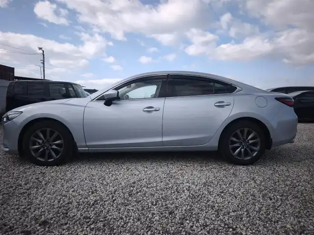 マツダ マツダ６セダン 20S 愛媛県 2019(令1)年 5.4万km ソニックシルバーM 純正8型ナビ/バックモニター/ETC/クルーズコントロール/前後パーキングセンサー/衝突被害軽減ブレーキ/後退時ブレーキサポート/AT誤後発進抑制/車線逸脱警報/ブラインドスポットモニタリング/交通標識認識システム/ステアリング連動LEDヘッドランプ/革巻きステアリング/パドルシフト/純正17インチアルミホイール/スマートキー/プッシュエンジンスタート/禁煙車